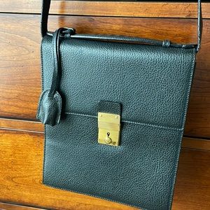 Gucci lockable envelope bag.